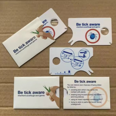 Logo trade business gifts image of: Custom Tick Removal Tool